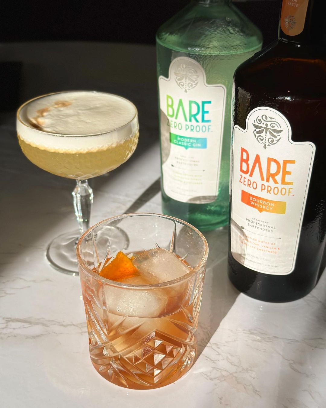 A set of non-alcoholic whiskey and gin from brand Bare and prepared in cocktails by non-alcoholic bar Good News opening in San Diego